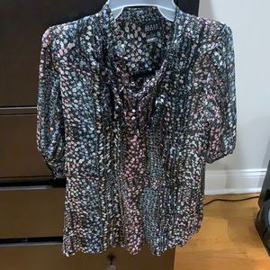 Black floral sheer top with buttons and ruffles